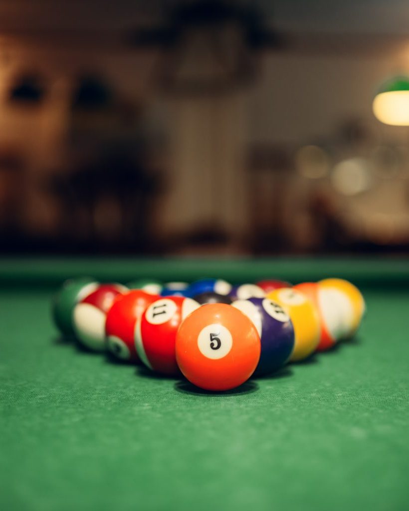 billiard-balls-on-green-table-american-pool-2021-08-26-16-26-35-utc-1024x1024